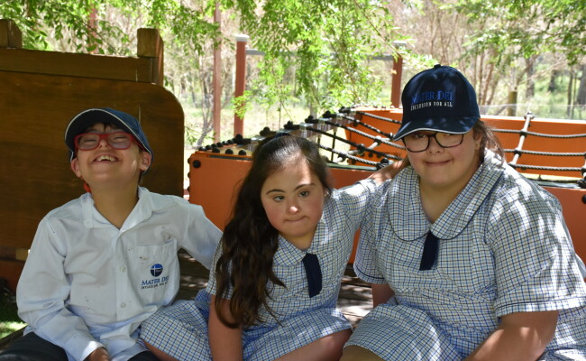 Students in Playground smiling